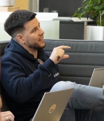 Carlos Morales at a team meeting